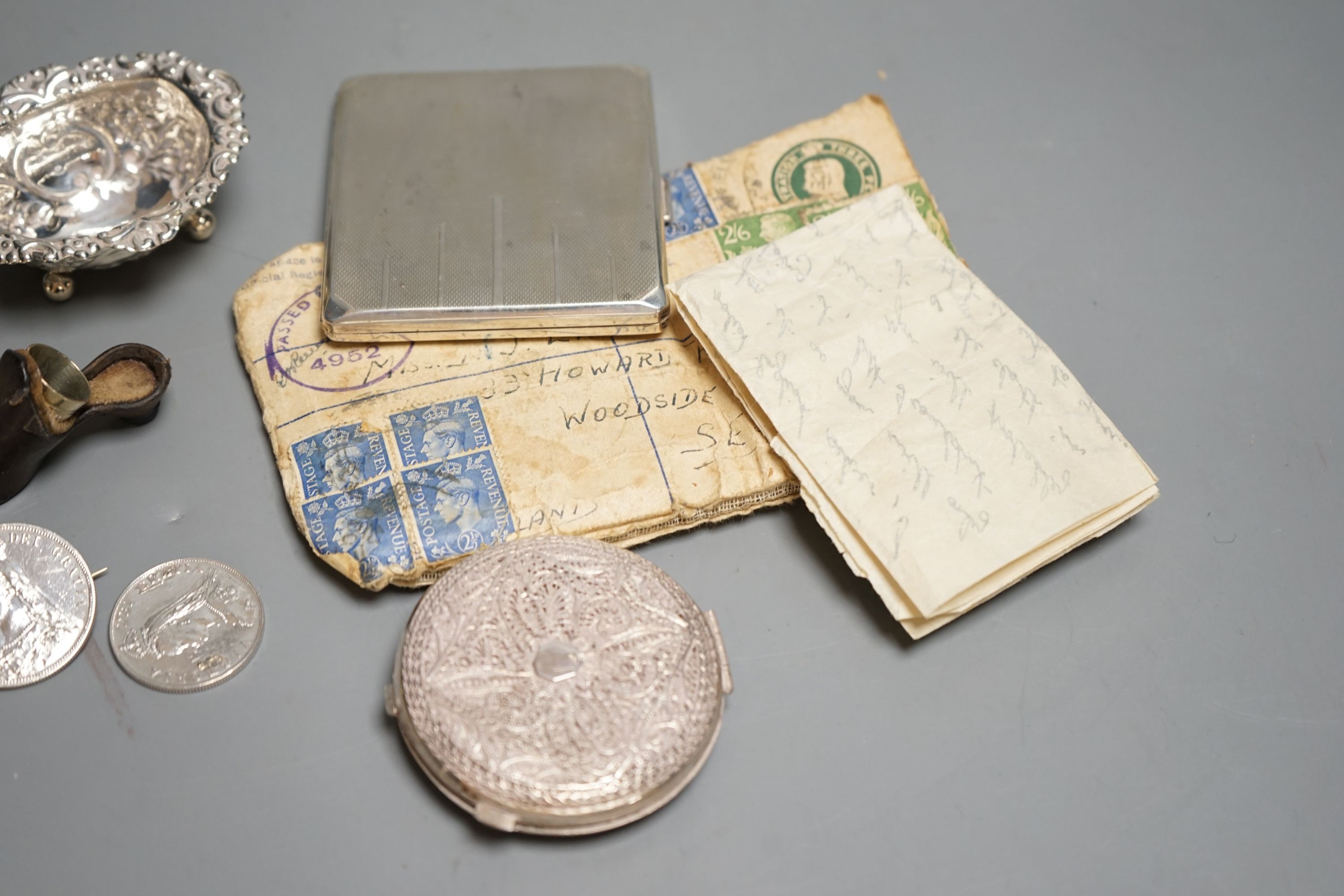 A silver cigarette case, Georgian silver caddy spoon, London, 1817, a pair of silver salts, etc.